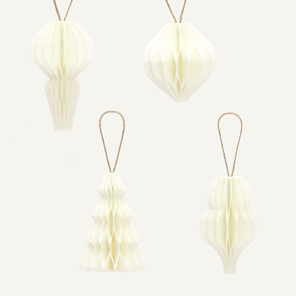 Sæt med fire hvid honeycomb juleornamenter som julepynt