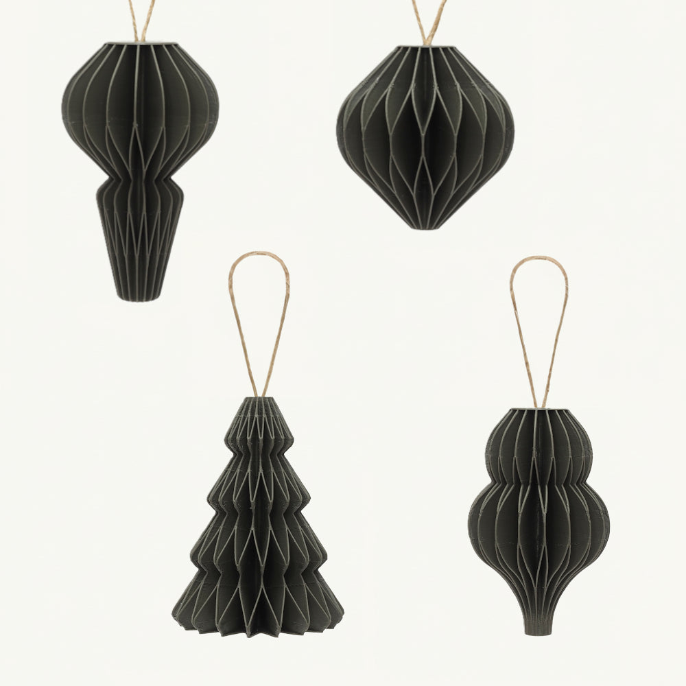 Sæt med fire grønne honeycomb juleornamenter som julepynt