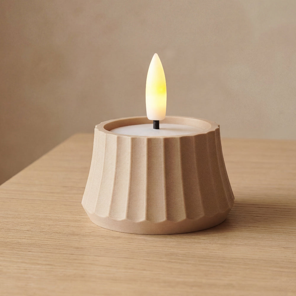 ARC fyrfadsstage i beige fra Hartli – minimalistisk lysestage i dansk design med bløde buer.