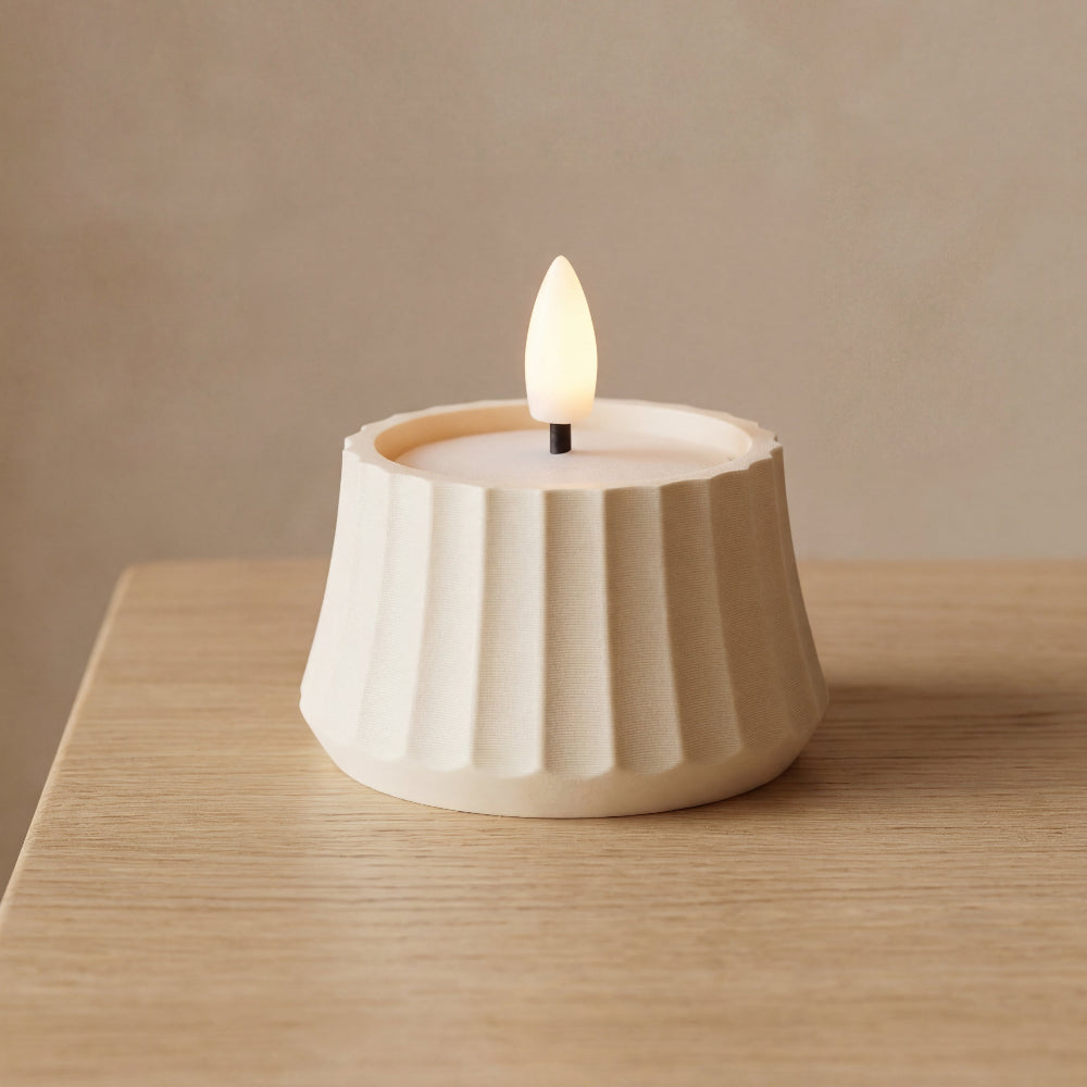 ARC fyrfadsstage i cream fra Hartli – minimalistisk lysestage i dansk design med bløde buer.
