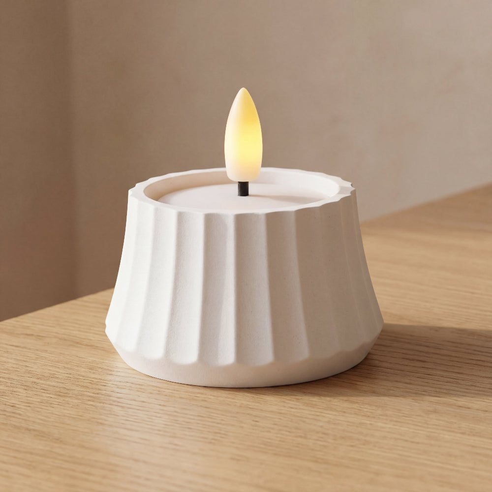 ARC fyrfadsstage i hvid fra Hartli – minimalistisk lysestage i dansk design med bløde buer.