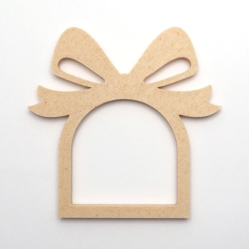 Birk farve servietring med sløjfe design, perfekt til jule som juleservietring til borddækning. 