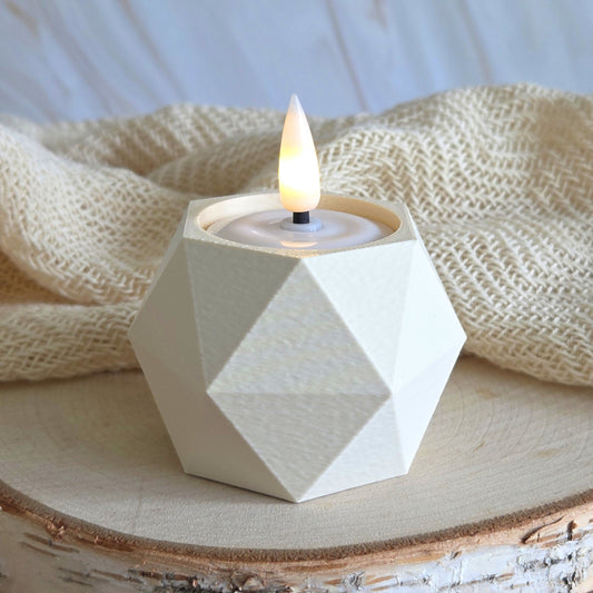 Cream GEOMETRIC vendbar lysestage med LED fyrfadslys – skaber rolig stemning i dansk design