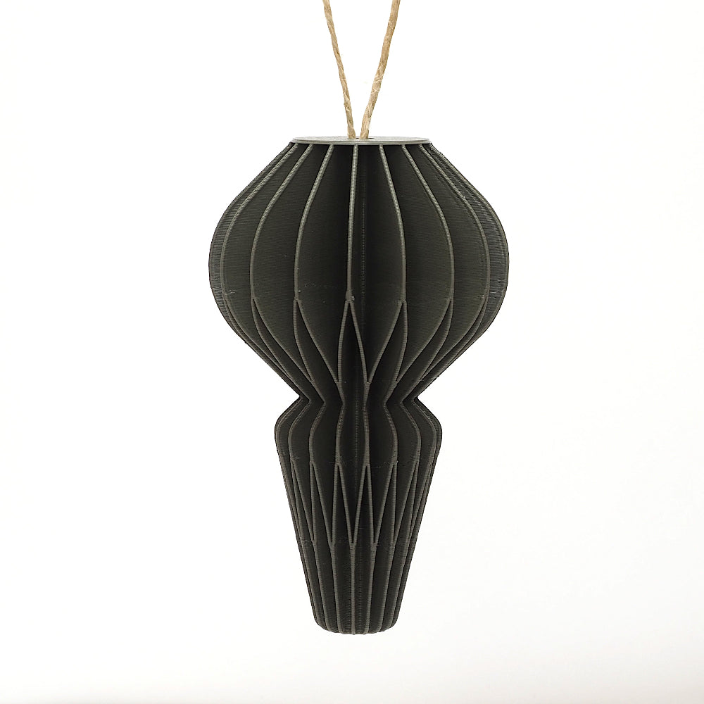 Grøn honeycomb julepynt hængt som juleornament