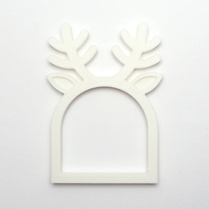 Hvid rensdyr servietring med gevirdetaljer, perfekt som juleservietring til borddækning. 