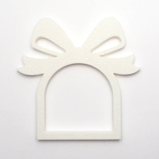 Hvid servietring med sløjfe design, perfekt til jule som juleservietring til borddækning. 