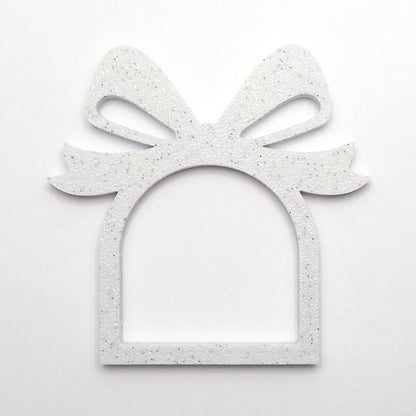 Marmorlook servietring med sløjfe design, perfekt til jule som juleservietring til borddækning. 